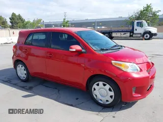 2008 Scion xD with VIN JTKKU10428J017502, listed as a IAAI auction lot 42057909 with 149,789 mi miles. Bid and sale history available at carsss.com. Image 1.