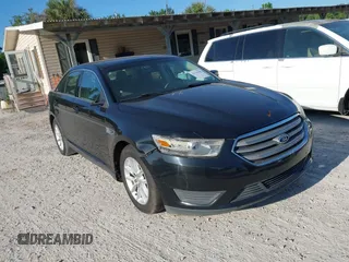 2013 Ford Taurus SE z VIN 1FAHP2D88DG215557, wystawiony jako IAAI lot #42336198 z przebiegiem 150 474 mil mil oraz . Historia ofert i sprzedaży dostępna na DreamBid. Obrazek 1.