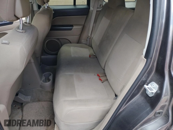 2015 Jeep Patriot Sport with VIN 1C4NJPBB9FD118169, listed as a Copart auction lot 55759395 with 197,648 mi miles and Clean Title. Bid and sale history available at DreamBid. Image 6.