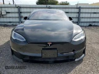 2022 Tesla Model S Plaid z VIN 5YJSA1E64NF461218, wystawiony jako Copart lot #84467644 z przebiegiem Nie podano mil oraz Szkoda całkowita • Salvage title. Historia ofert i sprzedaży dostępna na DreamBid. Obrazek 5.