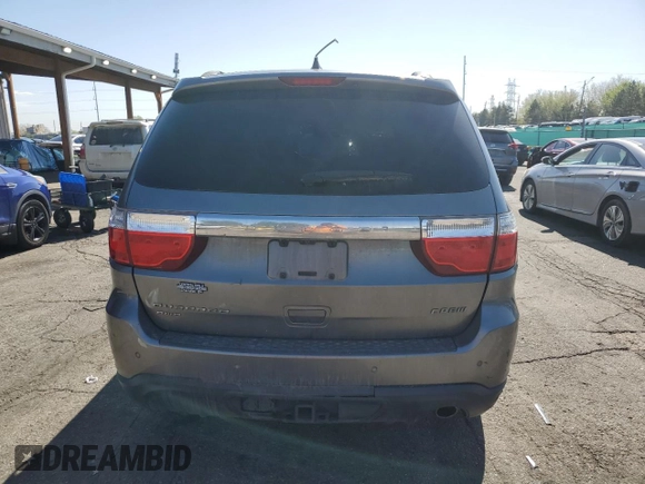 2013 Dodge Durango Crew with VIN 1C4RDJDG7DC554102, listed as a Copart auction lot 54045335 with 228,176 mi miles and Salvage Title. Bid and sale history available at DreamBid. Image 6.