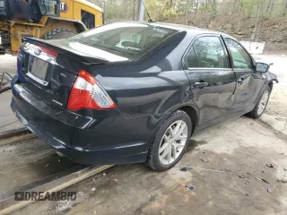 2011 Ford Fusion SEL with VIN 3FAHP0JG8BR315874, listed as a Copart auction lot 51716155 with 148,736 mi miles and Salvage Title. Bid and sale history available at carsss.com. Image 3.