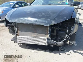 2016 Audi A5 Premium Plus z VIN WAUM2AFR5GA011293, wystawiony jako IAAI lot #41990091 z przebiegiem 131 353 mil mil oraz . Historia ofert i sprzedaży dostępna na DreamBid. Obrazek 6.