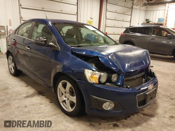 2012 Chevrolet Sonic LTZ z VIN 1G1JE5SB4C4214450, wystawiony jako IAAI lot #42207345 z przebiegiem 120 152 mil mil oraz . Historia ofert i sprzedaży dostępna na DreamBid. Obrazek 1.