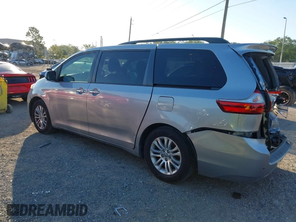 2015 Toyota Sienna XLE with VIN 5TDYK3DC9FS610925, listed as a IAAI auction lot 42022267 with 153,997 mi miles. Bid and sale history available at carsss.com. Image 3.