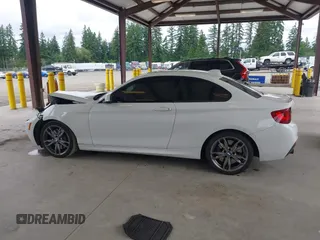 2016 BMW 2 Series M235i z VIN WBA1J7C52GV360561, wystawiony jako IAAI lot #42429129 z przebiegiem 90 218 mil mil oraz . Historia ofert i sprzedaży dostępna na DreamBid. Obrazek 14.
