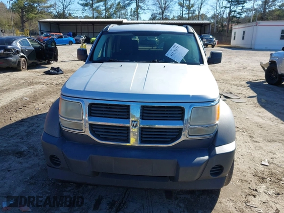 2007 Dodge Nitro SXT with VIN 1D8GT28K97W642118, listed as a IAAI auction lot 41276172 with 385,441 mi miles. Bid and sale history available at carsss.com. Image 12.