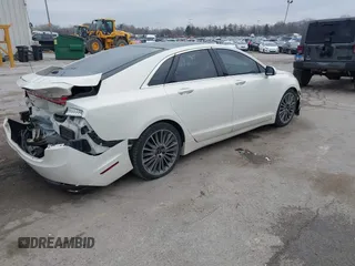 2013 Lincoln MKZ z VIN 3LN6L2GK9DR811737, wystawiony jako IAAI lot #42011896 z przebiegiem 100 669 mil mil oraz . Historia ofert i sprzedaży dostępna na DreamBid. Obrazek 4.