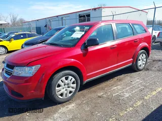 2014 Dodge Journey American Value Pkg with VIN 3C4PDCAB8ET170668, listed as a IAAI auction lot 41662590 with 167,776 mi miles. Bid and sale history available at carsss.com. Image 2.