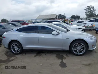 2013 Tesla Model S with VIN 5YJSA1DG7DFP11382, listed as a IAAI auction lot 42056169 with 126,975 mi miles. Bid and sale history available at carsss.com. Image 13.