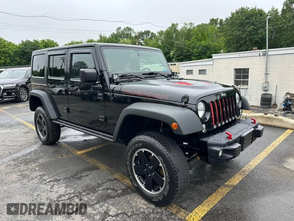 2015 Jeep Wrangler Unlimited Rubicon z VIN 1C4BJWFG2FL541572, wystawiony jako Copart lot #61723875 z przebiegiem 163 169 mil mil oraz Czysty tytuł • Clean title. Historia ofert i sprzedaży dostępna na DreamBid. Obrazek 4.