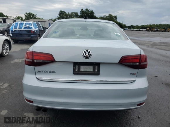 2017 Volkswagen Jetta SEL z VIN 3VWL17AJ6HM412147, wystawiony jako Copart lot #63333085 z przebiegiem Nie podano mil oraz Szkoda całkowita • Salvage title. Historia ofert i sprzedaży dostępna na DreamBid. Obrazek 6.