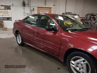 2002 Pontiac Grand Am SE z VIN 1G2NE52F92C291335, wystawiony jako IAAI lot #41665150 z przebiegiem 75 552 mil mil oraz . Historia ofert i sprzedaży dostępna na DreamBid. Obrazek 6.