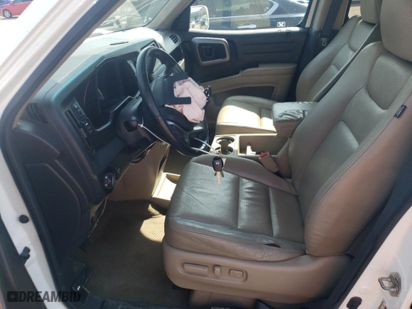 2009 Honda Ridgeline RTL with VIN 5FPYK16589B100942, listed as a Copart auction lot 69424014 with 211,003 mi miles and Salvage Title. Bid and sale history available at carsss.com. Image 7.