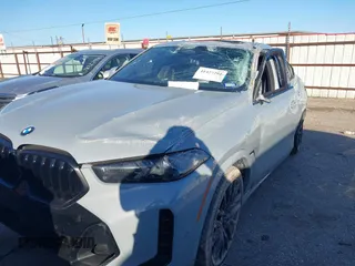 2024 BMW X6 xDrive40i with VIN 5UX33EX02R9T41673, listed as a IAAI auction lot 41427201 with 14,266 mi miles. Bid and sale history available at carsss.com. Image 2.