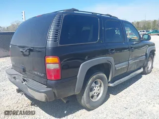 2002 Chevrolet Tahoe LT with VIN 1GNEC13Z42R245581, listed as a IAAI auction lot 41810788 with 228,166 mi miles. Bid and sale history available at carsss.com. Image 4.