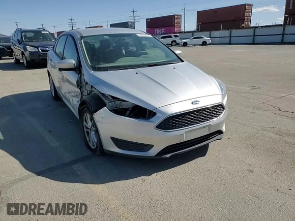 2018 Ford Focus SE z VIN 1FADP3F29JL206110, wystawiony jako Copart lot #53953515 z przebiegiem 80 841 mil mil oraz Szkoda całkowita • Salvage title. Historia ofert i sprzedaży dostępna na DreamBid. Obrazek 14.