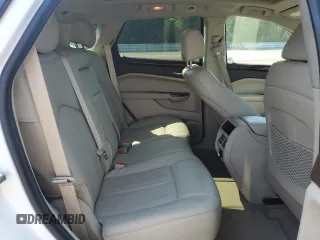 2014 Cadillac SRX Performance Collection with VIN 3GYFNCE38ES629600, listed as a Copart auction lot 61622725 with 86,183 mi miles and Salvage title. Bid and sale history available at DreamBid. Image 11.