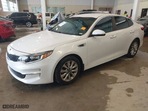 2018 Kia Optima LX with VIN 5XXGT4L36JG273964, listed as a IAAI auction lot 41552736 with 71,923 mi miles. Bid and sale history available at carsss.com. Image 2.