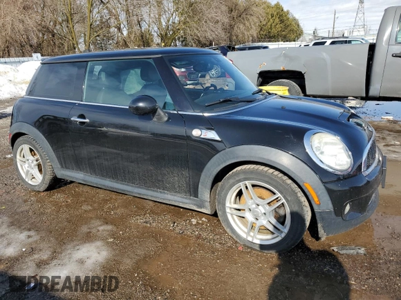 2009 MINI Hardtop S with VIN WMWMF73559TW85198, listed as a Copart auction lot 47538725 with 136,006 mi miles and Salvage title. Bid and sale history available at DreamBid. Image 4.