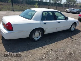 1998 Mercury Grand Marquis LS with VIN 2MEFM75W3WX644251, listed as a IAAI auction lot 42099151 with 195,304 mi miles and . Bid and sale history available at DreamBid. Image 4.