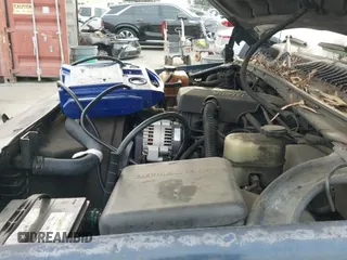2000 Chevrolet Silverado 1500 LS z VIN 2GCEC19T8Y1147120, wystawiony jako IAAI lot #43341426 z przebiegiem 298 360 mil mil oraz . Historia ofert i sprzedaży dostępna na DreamBid. Obrazek 12.