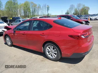 2025 Toyota Camry LE with VIN 4T1DAACK0SU016434, listed as a Copart auction lot 55310005 with 25,599 mi miles and Clean Title. Bid and sale history available at carsss.com. Image 2.