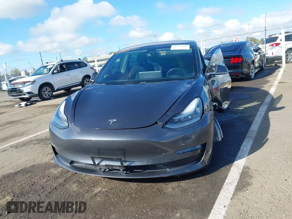 2018 Tesla Model 3 Long Range Battery with VIN 5YJ3E1EA4JF006036, listed as a IAAI auction lot 41934680 with 115,649 mi miles and . Bid and sale history available at DreamBid. Image 11.
