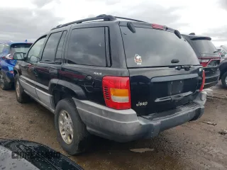 2000 Jeep Grand Cherokee Laredo with VIN 1J4GW48S7YC100739, listed as a Copart auction lot 89072965 with 150,333 mi miles and Salvage title. Bid and sale history available at DreamBid. Image 2.