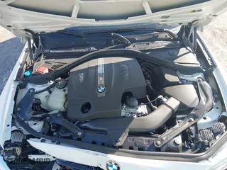 2017 BMW M2 with VIN WBS1H9C55HV886803, listed as a IAAI auction lot 41241081 with 37,874 mi miles. Bid and sale history available at carsss.com. Image 10.