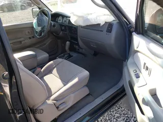 2004 Toyota Tacoma PreRunner z VIN 5TEGN92N74Z344833, wystawiony jako IAAI lot #42078554 z przebiegiem 227 310 mil mil oraz . Historia ofert i sprzedaży dostępna na DreamBid. Obrazek 5.