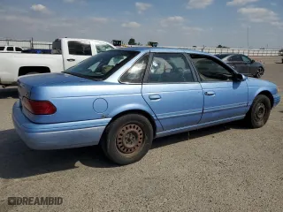 1995 Ford Taurus GL with VIN 1FALP52U6SG266810, listed as a Copart auction lot 53521525 with 63,135 mi miles and Clean Title. Bid and sale history available at carsss.com. Image 3.