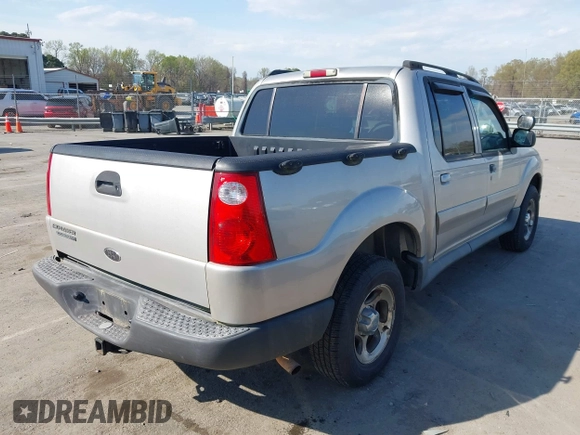 2004 Ford Explorer Sport Trac XLS z VIN 1FMZU77K74UA28903, wystawiony jako IAAI lot #41891563 z przebiegiem 186 399 mil mil oraz . Historia ofert i sprzedaży dostępna na DreamBid. Obrazek 4.