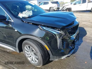 2021 Cadillac XT4 FWD Premium Luxury with VIN 1GYFZCR43MF052422, listed as a IAAI auction lot 41985859 with 25,112 mi miles. Bid and sale history available at carsss.com. Image 17.