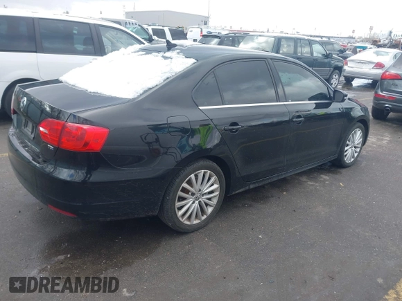 2014 Volkswagen Jetta TDI w/Premium with VIN 3VWLL7AJ3EM276789, listed as a IAAI auction lot 41805737 with 160,500 mi miles and . Bid and sale history available at DreamBid. Image 4.