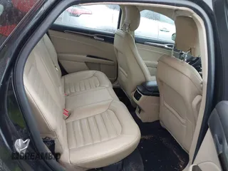 2014 Ford Fusion SE z VIN 3FA6P0H98ER161265, wystawiony jako IAAI lot #42312309 z przebiegiem 141 975 mil mil oraz . Historia ofert i sprzedaży dostępna na DreamBid. Obrazek 8.