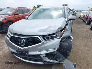 2020 Acura MDX with VIN 5J8YD3H32LL016504, listed as a IAAI auction lot 42126961 with 90,307 mi miles and . Bid and sale history available at DreamBid. Image 6.