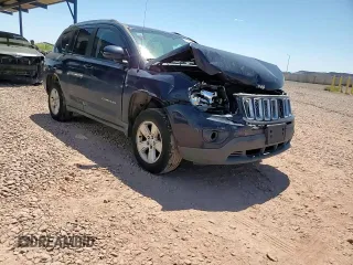2016 Jeep Compass Latitude z VIN 1C4NJCEAXGD735156, wystawiony jako Copart lot #56607755 z przebiegiem 163 996 mil mil oraz Szkoda całkowita • Salvage title. Historia ofert i sprzedaży dostępna na DreamBid. Obrazek 14.