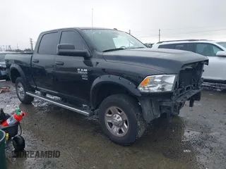 2016 Ram 2500 Tradesman z VIN 3C6UR5CJ2GG324895, wystawiony jako IAAI lot #41490356 z przebiegiem 165 201 mil mil oraz . Historia ofert i sprzedaży dostępna na DreamBid. Obrazek 1.