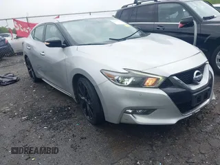 2017 Nissan Maxima SR z VIN 1N4AA6AP2HC396545, wystawiony jako IAAI lot #41910588 z przebiegiem 142 661 mil mil oraz . Historia ofert i sprzedaży dostępna na DreamBid. Obrazek 1.