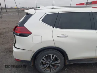 2019 Nissan Rogue SV with VIN JN8AT2MT4KW263267, listed as a IAAI auction lot 41155792 with 106,668 mi miles. Bid and sale history available at carsss.com. Image 17.