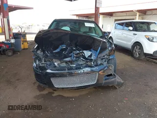 2014 Chevrolet Impala LT with VIN 2G1WB5E34E1158088, listed as a IAAI auction lot 42417592 with 92,995 mi miles and . Bid and sale history available at DreamBid. Image 6.