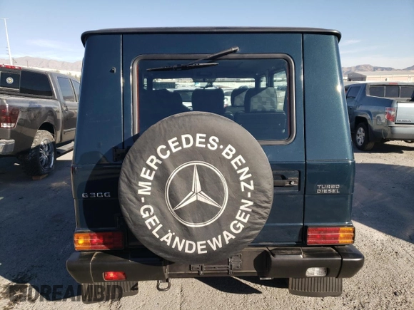 1996 Mercedes-Benz 300 with VIN WDB46333117106110, listed as a Copart auction lot 77159894 with Not Provided miles and Salvage Title. Bid and sale history available at DreamBid. Image 6.