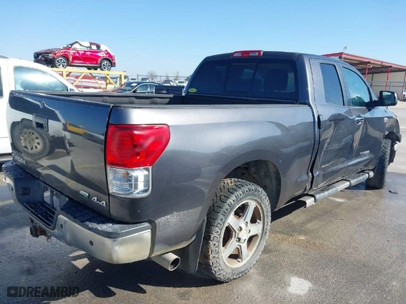 2013 Toyota Tundra 4WD Truck with VIN 5TFUW5F16DX307070, listed as a IAAI auction lot 41306027 with 258,219 mi miles. Bid and sale history available at carsss.com. Image 4.
