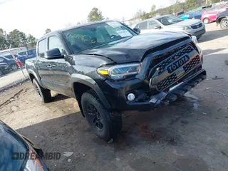 2021 Toyota Tacoma 4WD SR with VIN 3TYCZ5AN8MT049626, listed as a IAAI auction lot 41452656 with 48,927 mi miles. Bid and sale history available at carsss.com. Image 1.