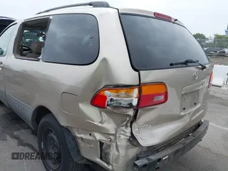 2000 Toyota Sienna CE z VIN 4T3GF19C0YU240639, wystawiony jako IAAI lot #42472106 z przebiegiem 142 456 mil mil oraz . Historia ofert i sprzedaży dostępna na DreamBid. Obrazek 6.