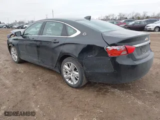 2016 Chevrolet Impala LS with VIN 2G11X5SA1G9178480, listed as a IAAI auction lot 41509718 with 166,099 mi miles. Bid and sale history available at carsss.com. Image 3.