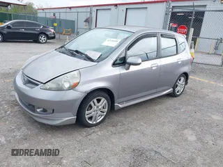 2007 Honda Fit Sport with VIN JHMGD37697S040265, listed as a IAAI auction lot 42130310 with 127,906 mi miles. Bid and sale history available at carsss.com. Image 2.