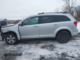 2012 Dodge Journey SXT with VIN 3C4PDCCG6CT135911, listed as a IAAI auction lot 41448632 with 179,440 mi miles and . Bid and sale history available at DreamBid. Image 14.