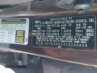 2012 Kia Sorento EX with VIN 5XYKUDA23CG206609, listed as a IAAI auction lot 42142072 with 162,574 mi miles. Bid and sale history available at carsss.com. Image 9.